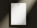 Elegancki papier firmowy z logo KACZYŃSKI. Różne rodzaje papieru mogą być użyte do druku, od gładkich po strukturalne.