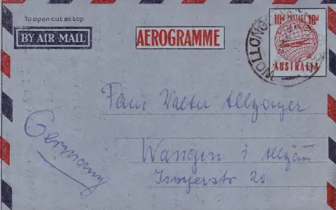 Aerogram z Niemiec do Australii. Na kopercie widnieje skrót "Szanowni Państwo" w formie odręcznego napisu.