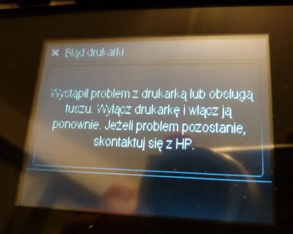 Komunikat o błędzie drukarki HP: "Wystąpił problem z drukarką lub obsługą tuszu. Wyłącz drukarkę i włącz ją ponownie. Jeżeli problem pozostanie, skontaktuj się z HP.